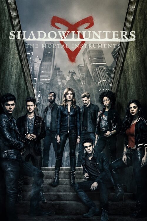 The cast of Shadowhunters standing on stairs