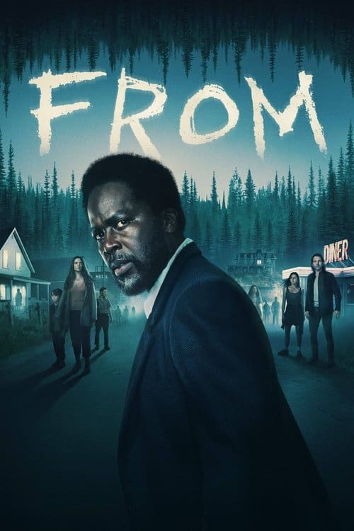 This is a vertical poster for the series "From." A dark-skinned man with an afro and beard, dressed in a black blazer and white shirt, stands on a dark, tree-lined street. He looks back over his shoulder with a serious, intense gaze. Behind him, a small group of people (a family and others) stand in a line on the street, illuminated by an unseen light source from the right, which also highlights a neon "DINER" sign. The street is bordered by houses and a dense, dark forest that recedes into a deep blue-green, foggy sky. At the very top, the entire dark forest is inverted, with the trees growing downwards into the sky. The title "FROM" is centered above the man, rendered in a large, white, chalk-like, scratched font.