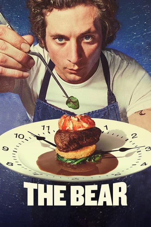 Poster for The Bear showing chef Carmy plating an elegant dish on a plate designed like a clock while concentrating on the food.