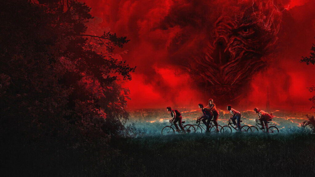 A group of kids ride bicycles across a dark field as a massive red storm looms in the sky behind them in Stranger Things.