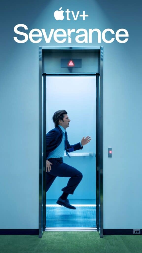 Young man running out of an elevator in professional attire, representing suspense and drama, for Severance series on Apple TV+.