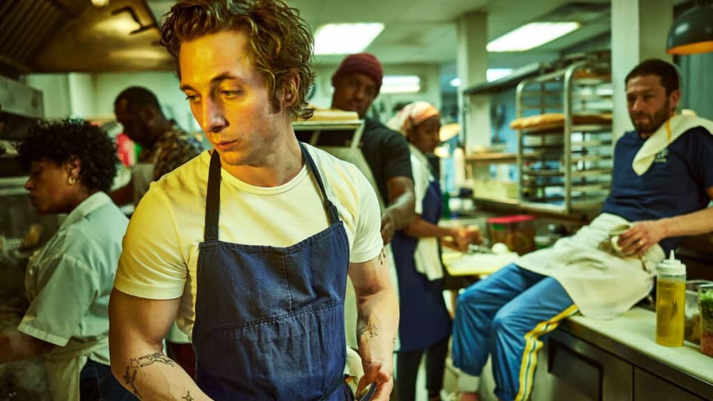Carmy concentrates while cooking during a fast paced service in the restaurant kitchen on The Bear