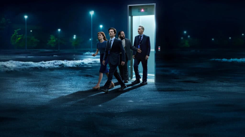 Office workers in formal clothing walking out of an elevator into a dark, empty outdoor space in a surreal scene from Severance