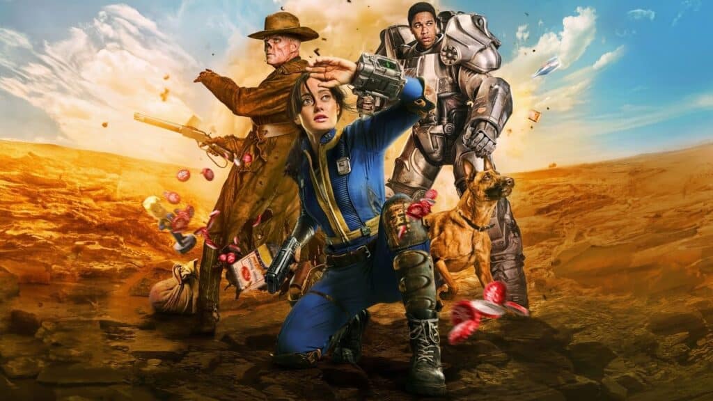 Action artwork from Fallout showing Lucy kneeling in the foreground with The Ghoul, Maximus in power armor, and Dogmeat in a rocky desert wasteland.