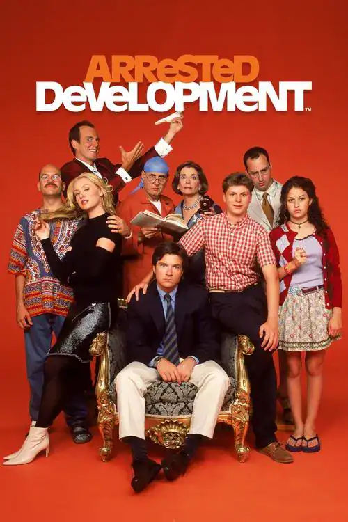 The eccentric Bluth family posed uncomfortably together on a red background for an "Arrested Development" promotional photo.