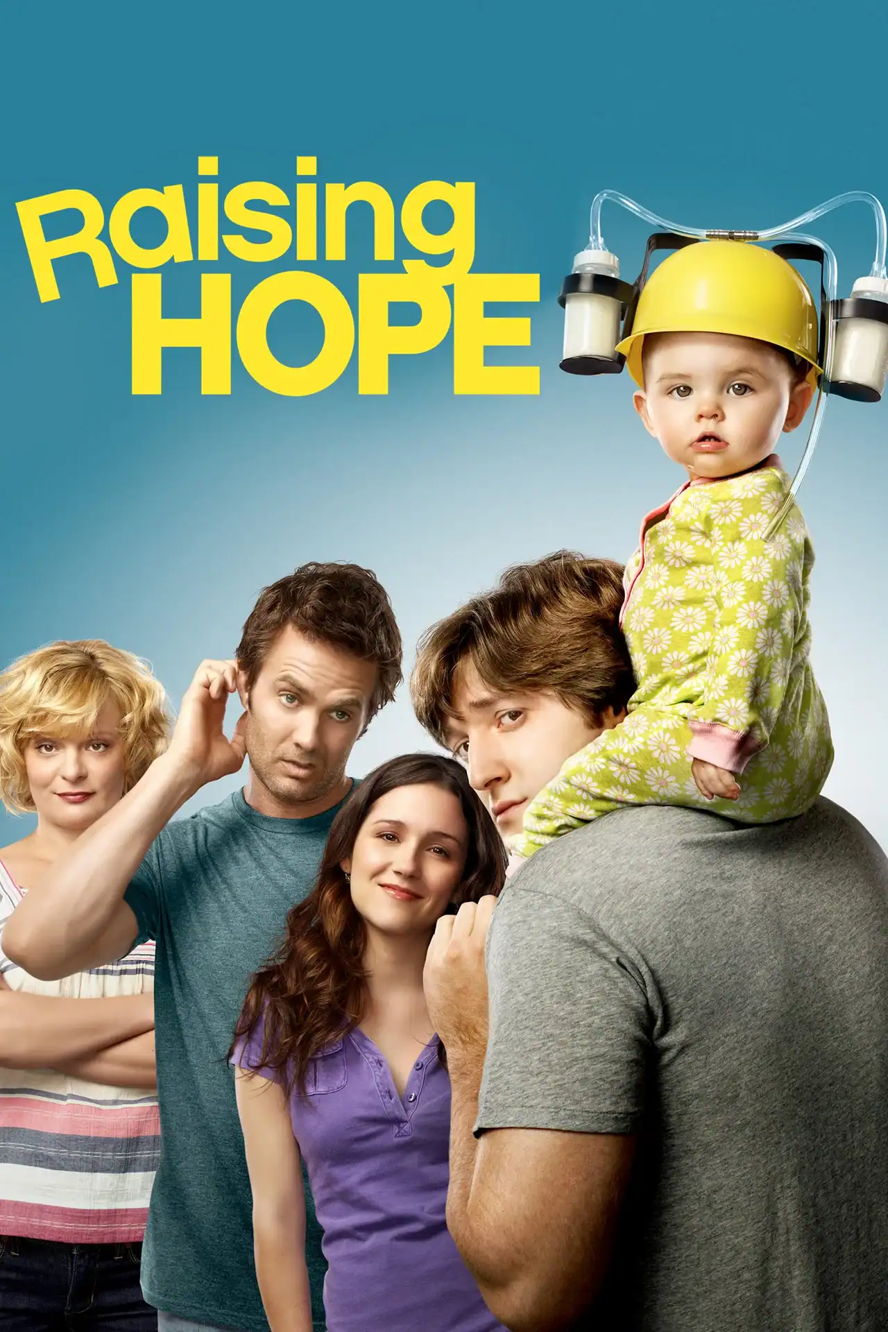 Virginia, Burt, Jimmy, and Sabrina looking bewildered while baby Hope wears a homemade helmet with two baby bottles taped to it.