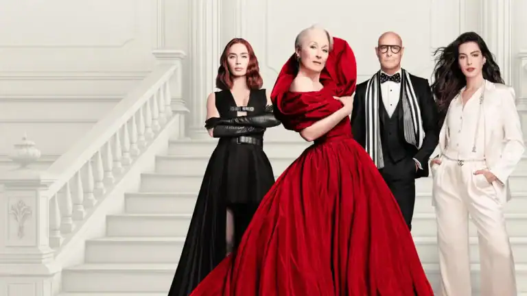 Wide cinematic banner for The Devil Wears Prada 2 showing Meryl Streep in a red gown standing with Anne Hathaway, Emily Blunt, and Stanley Tucci.