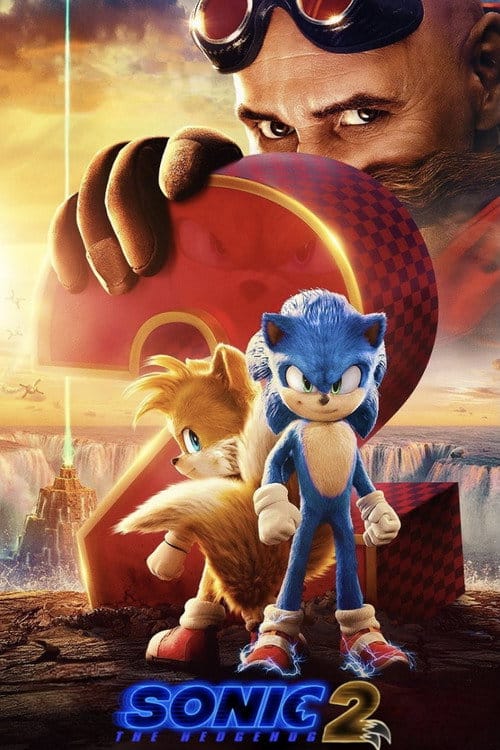 Promotional poster for Sonic the Hedgehog 2 featuring Sonic and Tails standing in front of a giant red number two with Dr. Robotnik peering over the top wearing his signature goggles.